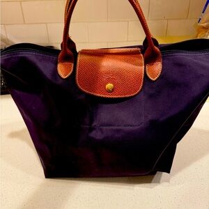 Purple great condition medium long champ bag